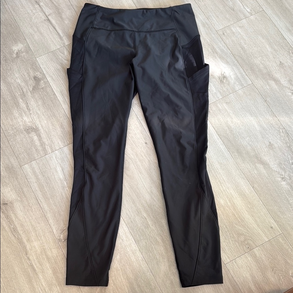 Lululemon very deep blue leggings . Pockets in the side and back